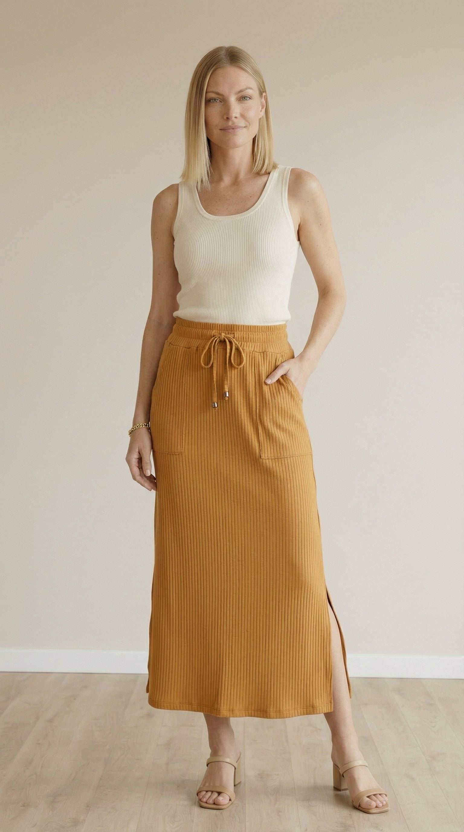 Saia Midi com Bolso e Fenda Lateral em Viscose Canelado